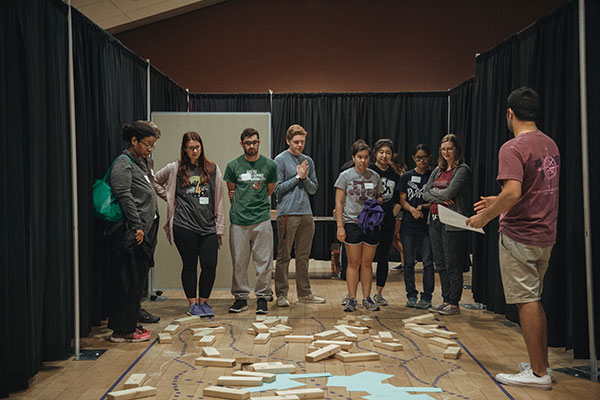 MSC FLI students guiding participants through Disaster 101, a program designed to simulate recovery efforts after a major disaster.