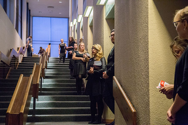 MSC OPAS Student Committee ushers standing outside the doors to the auditorium, ready to help patrons during an MSC OPAS show.